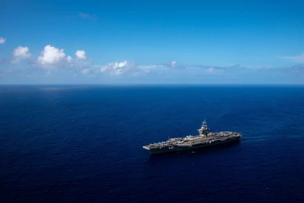  Nimitz-class aircraft carrier USS Carl Vinson transits the Philippine Sea to Guam for a port visit by U.S. Pacific Fleet