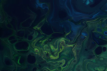 Abstract colors swirl in deep blues and greens; fluid marbling forms organic pools and veins. 2K Quad HD PC desktop wallpaper and background.