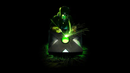 HD Xbox-themed wallpaper featuring a silhouette of a futuristic soldier with glowing green effects on a dark background.
