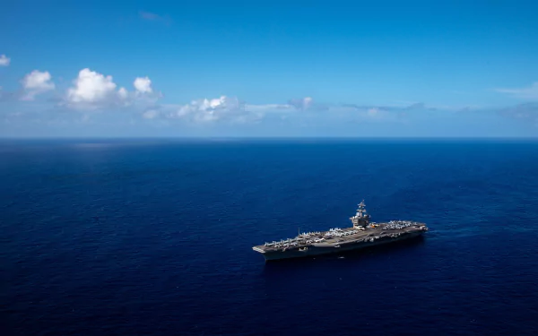  Nimitz-class aircraft carrier USS Carl Vinson transits the Philippine Sea to Guam for a port visit by U.S. Pacific Fleet