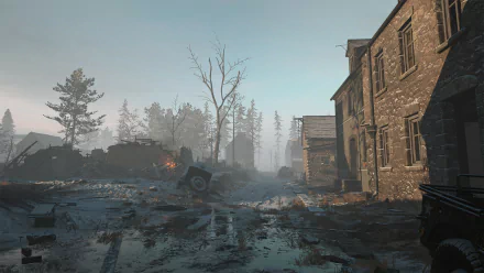 HD wallpaper of Hell Let Loose video game featuring misty wartime battle scene with ruins and tanks for desktop background.