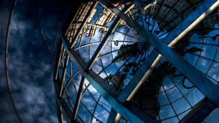 Abstract artistic wallpaper of a globe with a world map design, featuring a high-definition view with rich blue tones and intricate structural details.