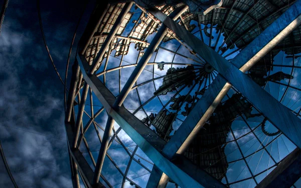 Abstract artistic wallpaper of a globe with a world map design, featuring a high-definition view with rich blue tones and intricate structural details.