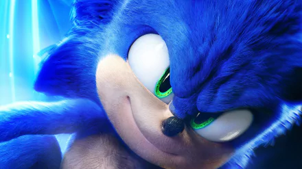 Close-up HD PC desktop wallpaper of Sonic the Hedgehog from the Sonic the Hedgehog 2 movie, showcasing his intense green eyes and blue fur in vivid detail.