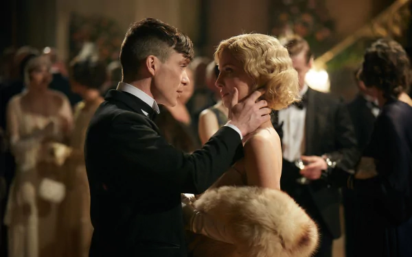 Cillian Murphy as Thomas Shelby from Peaky Blinders shares an intimate moment at a formal party in this HD TV show desktop wallpaper.