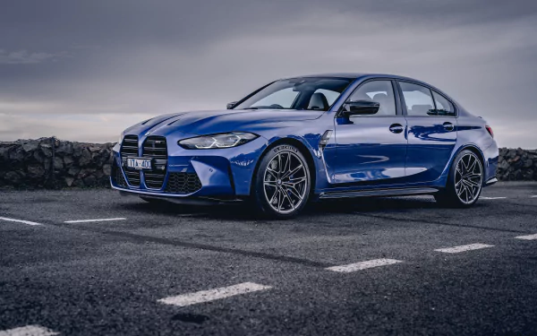 Blue BMW M3 parked on wet asphalt with a moody sky backdrop — 8K Ultra HD PC desktop wallpaper and background.