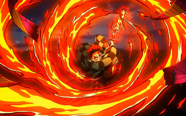 HD anime wallpaper featuring Tanjiro Kamado performing the fiery Hinokami Kagura technique from Demon Slayer: Kimetsu no Yaiba, surrounded by swirling flames.