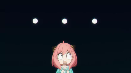 Anya Forger from Spy x Family with a surprised expression against a dark background, featured in an HD anime desktop wallpaper.