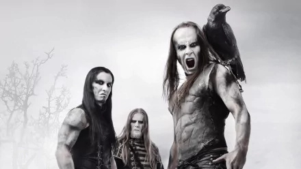 Black and white HD PC desktop wallpaper featuring the metal band Behemoth, with intense expressions and a crow perched on one member's shoulder.