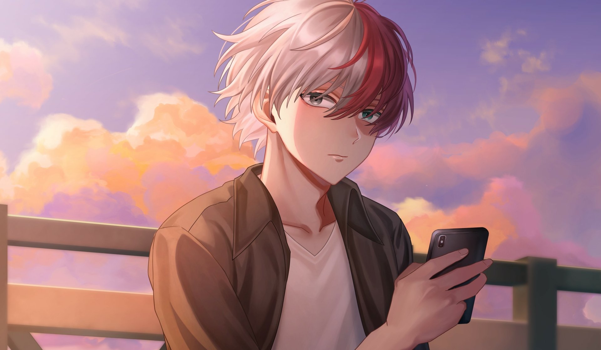 Shoto Todoroki from My Hero Academia is depicted in a 4K Ultra HD anime wallpaper, holding a phone against a vibrant sunset sky background.