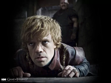 HD desktop wallpaper featuring Peter Dinklage as Tyrion Lannister from the TV show Game of Thrones in a dark, intense scene.