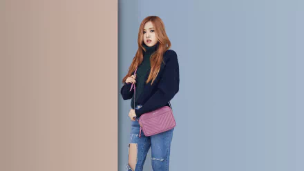 4K Ultra HD desktop wallpaper featuring Rosé from BlackPink, dressed in a black sweater and ripped jeans against a two-tone blue background.