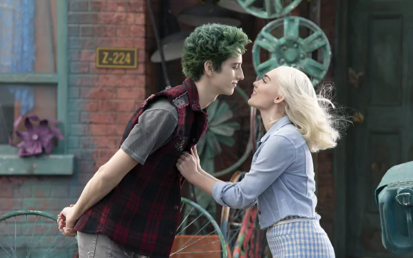 Movie Zombies 3 2K Quad HD PC desktop wallpaper, two young characters: green-haired male and blonde female lean in smiling against an industrial outdoor set.
