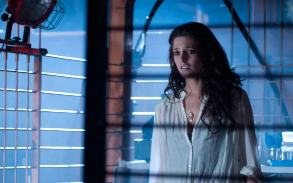 Ashley Greene in a tense scene from the 2012 movie The Apparition, featured as an HD PC desktop wallpaper and background.