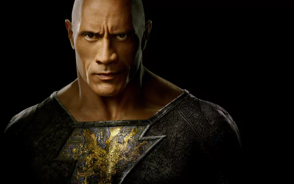 4K Ultra HD desktop wallpaper featuring Dwayne Johnson as Black Adam, showcasing his intense gaze and detailed superhero costume against a dark background.