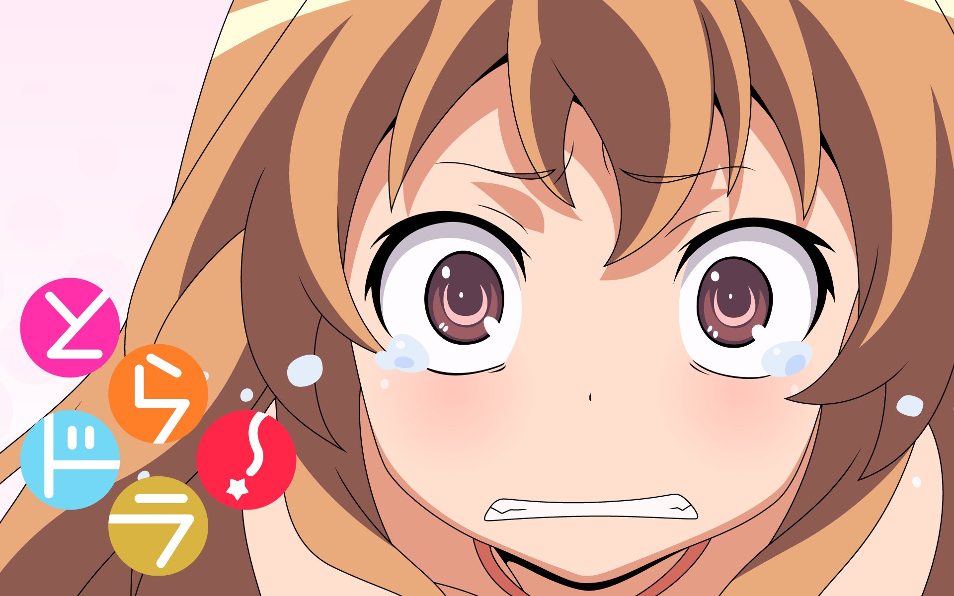 Toradora! anime HD PC desktop wallpaper: close-up of Taiga Aisaka with tears and a shocked expression, colorful circular logo icons and pale pink background.