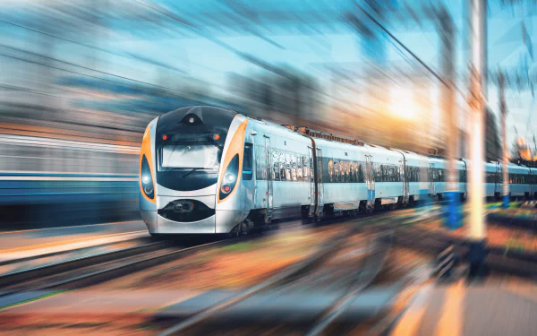 Motion blur captures a sleek vehicle speeding along train tracks in this 4K Ultra HD desktop wallpaper and background.