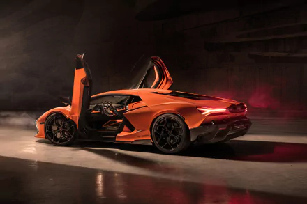 Ultra HD 8K desktop wallpaper featuring an orange Lamborghini Revuelto with scissor doors open, set against a dark, moody background.