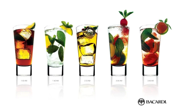 HD PC desktop wallpaper featuring five vibrant man-made Bacardi cocktails with fresh garnishes in clear glasses against a clean white background.