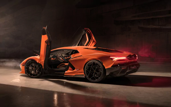 Ultra HD 8K desktop wallpaper featuring an orange Lamborghini Revuelto with scissor doors open, set against a dark, moody background.