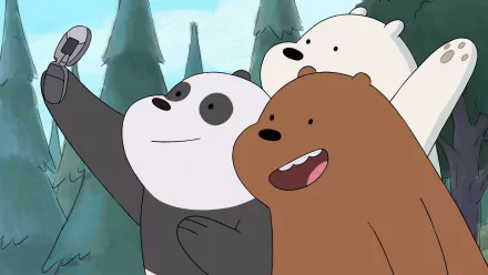 HD desktop wallpaper featuring the three main bears from the TV show We Bare Bears taking a selfie in a forest setting.