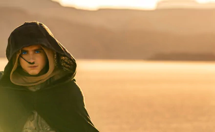 HD desktop wallpaper of Timothée Chalamet in character for Dune: Part Two with a desert backdrop.