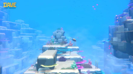HD wallpaper of Dave the Diver underwater exploration game with vivid coral and marine life for desktop background.