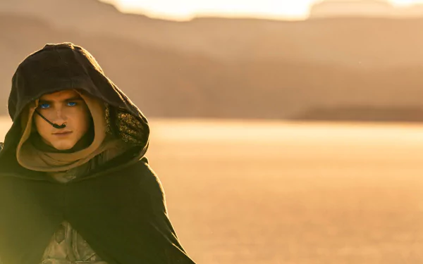 HD desktop wallpaper of Timothée Chalamet in character for Dune: Part Two with a desert backdrop.
