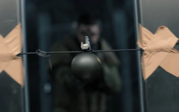 HD desktop wallpaper featuring a dramatic Extraction 2 movie scene with a tactical character in action behind a shattered glass.