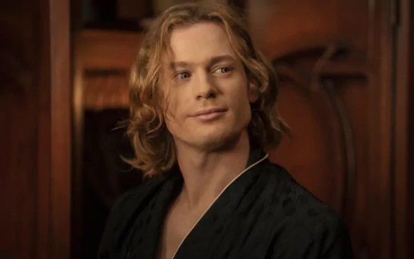 High-definition desktop wallpaper featuring a character from Interview with the Vampire series, set against a wooden backdrop for an atmospheric background.