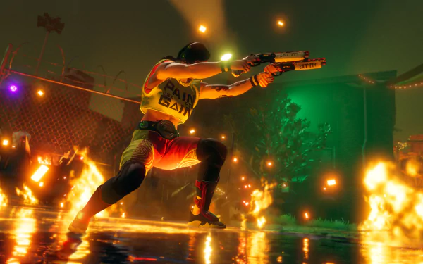 HD desktop wallpaper from Saints Row (2022) showing a character in dynamic gunfire action during a fiery night scene.