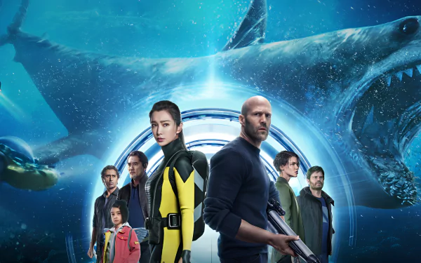 HD wallpaper of Meg 2: The Trench featuring Jason Statham and cast with a giant shark looming in the background.