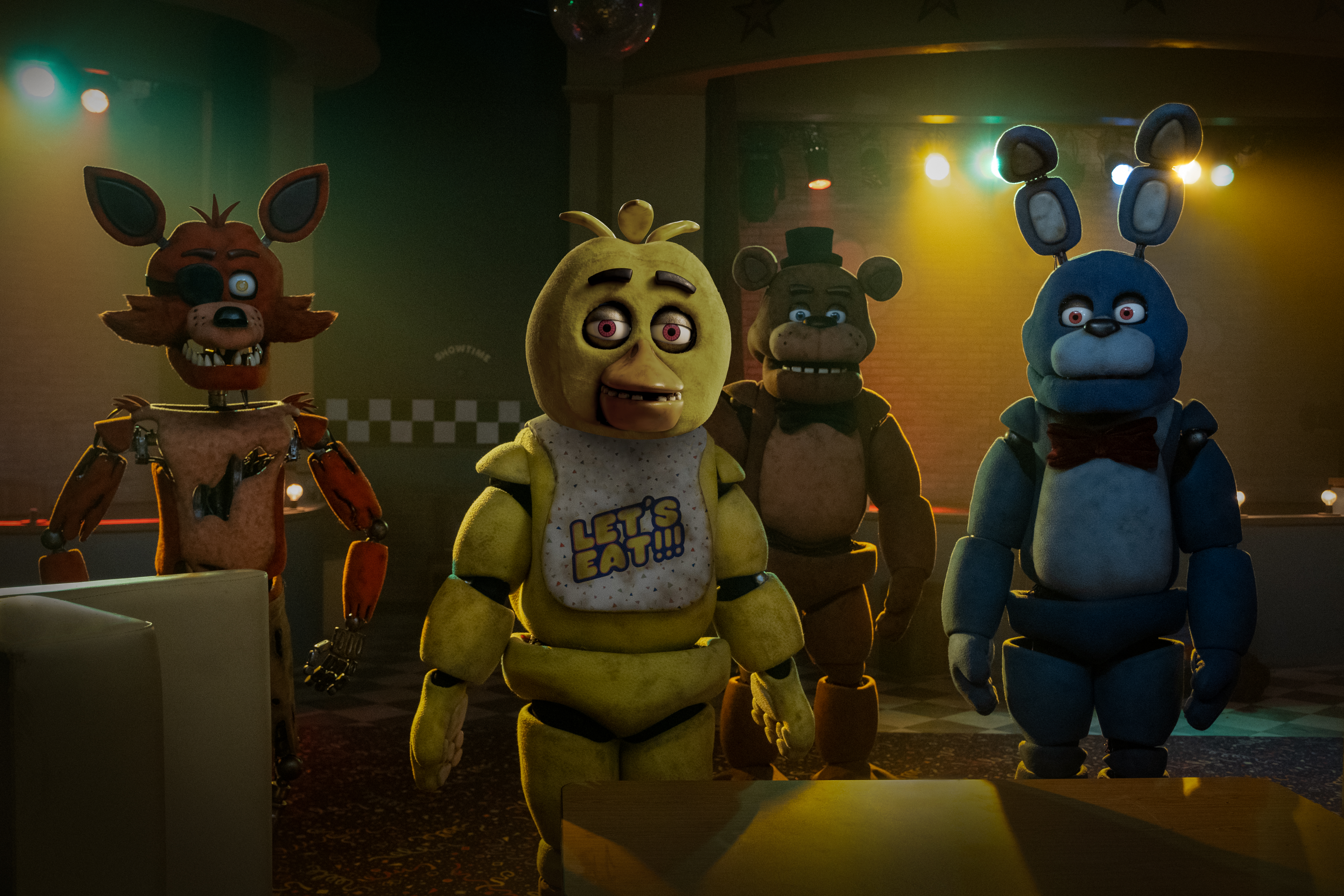 HD desktop wallpaper featuring characters from Five Nights at Freddy's game in a dimly lit room for fans of the series.