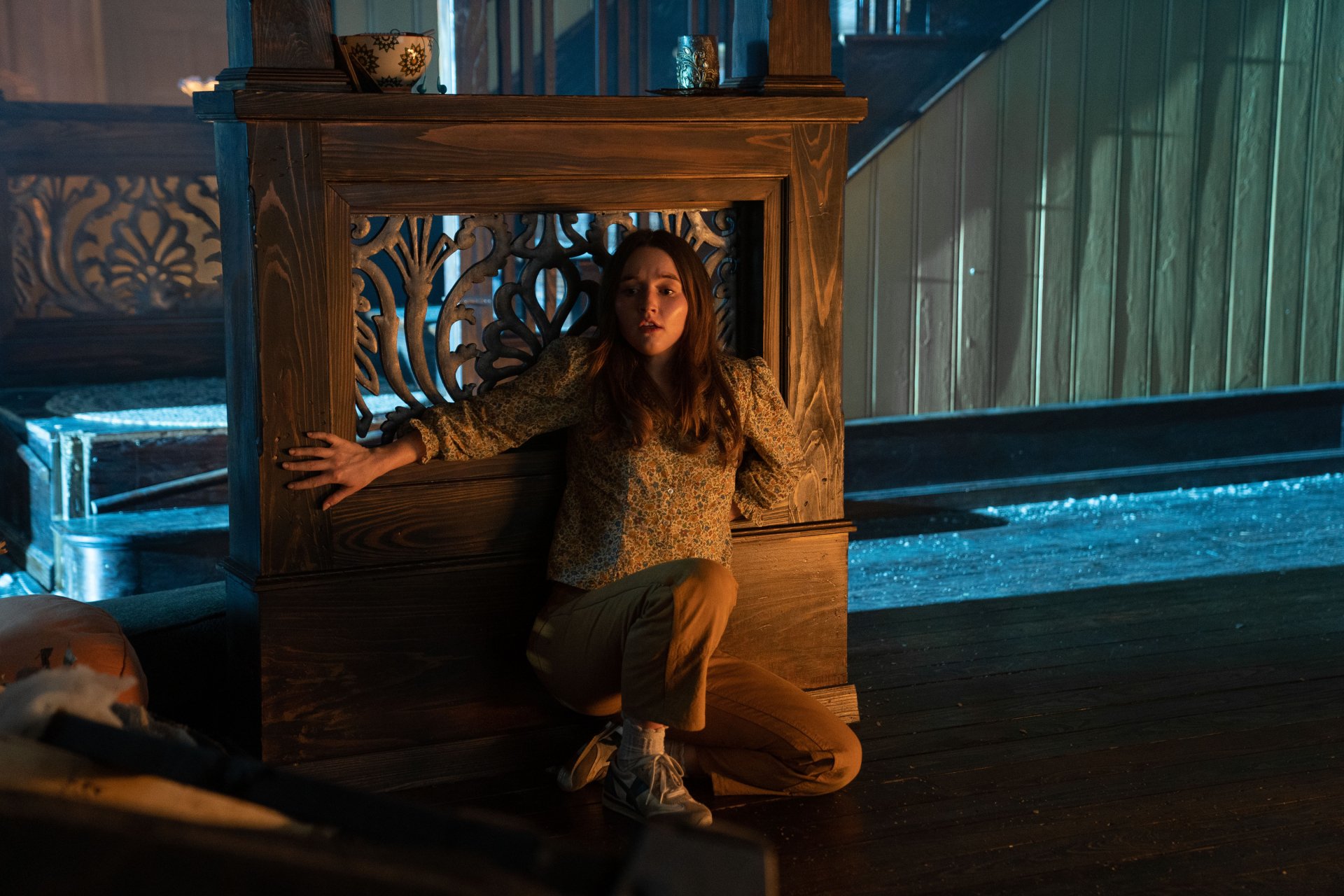 HD wallpaper featuring an intense scene with a person crouching by a decorative frame, tagged No One Will Save You.