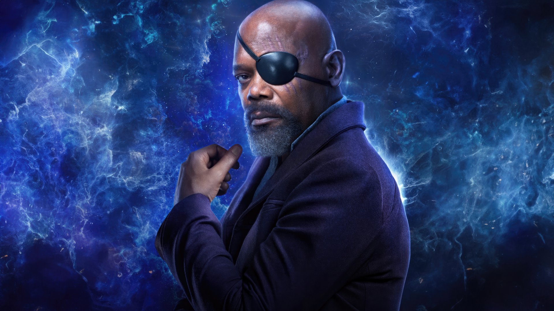 4K Ultra HD PC wallpaper featuring Nick Fury from the movie The Marvels with a cosmic blue background.