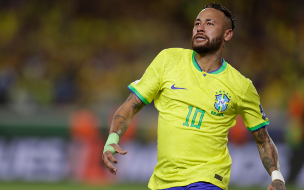 HD wallpaper of a Brazil National Football Team player in action on the field, perfect for desktop background.