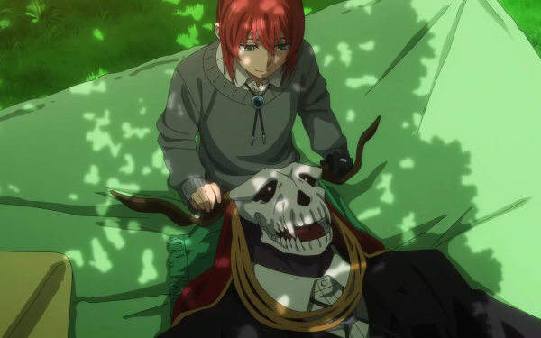HD Wallpaper of Chise Hatori and Elias Ainsworth from The Ancient Magus' Bride anime series, depicting a tender moment against a green background suitable for desktops.