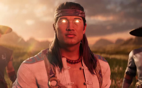 HD wallpaper of Liu Kang from Mortal Kombat 1 with a serene sunset background.