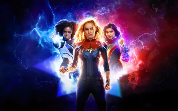 HD desktop wallpaper featuring characters from the movie The Marvels, depicting three superheroes surrounded by vibrant blue and red energy.