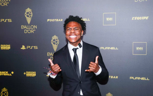 A dynamic HD desktop wallpaper featuring IShowSpeed at a glamorous event, showcasing his vibrant personality with a big smile and playful gestures against a stylish backdrop.