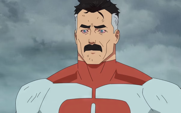 HD desktop wallpaper of Omni-Man from Invincible, with a focused expression against a cloudy sky background.