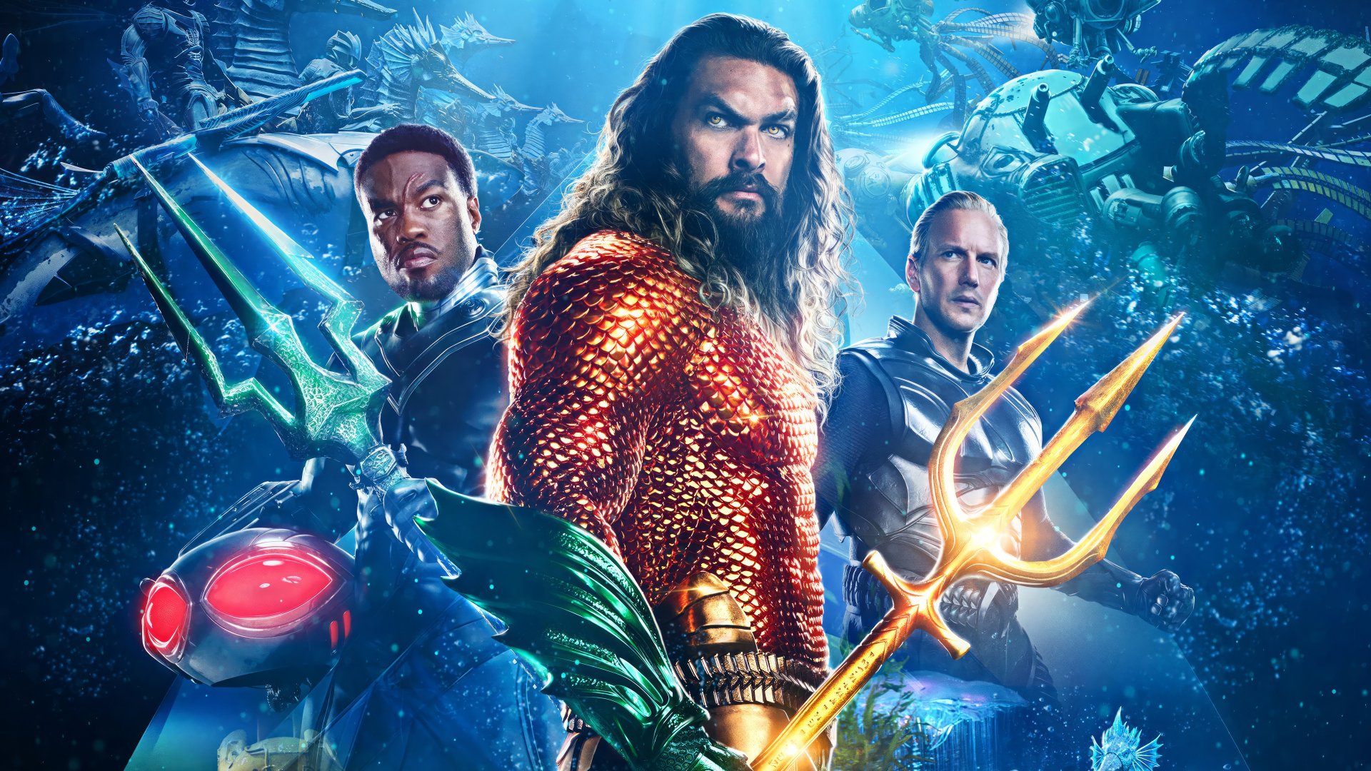 HD wallpaper featuring characters from Aquaman and The Lost Kingdom, showcasing the hero in vibrant costume with a trident, accompanied by allies, against a backdrop of underwater action.