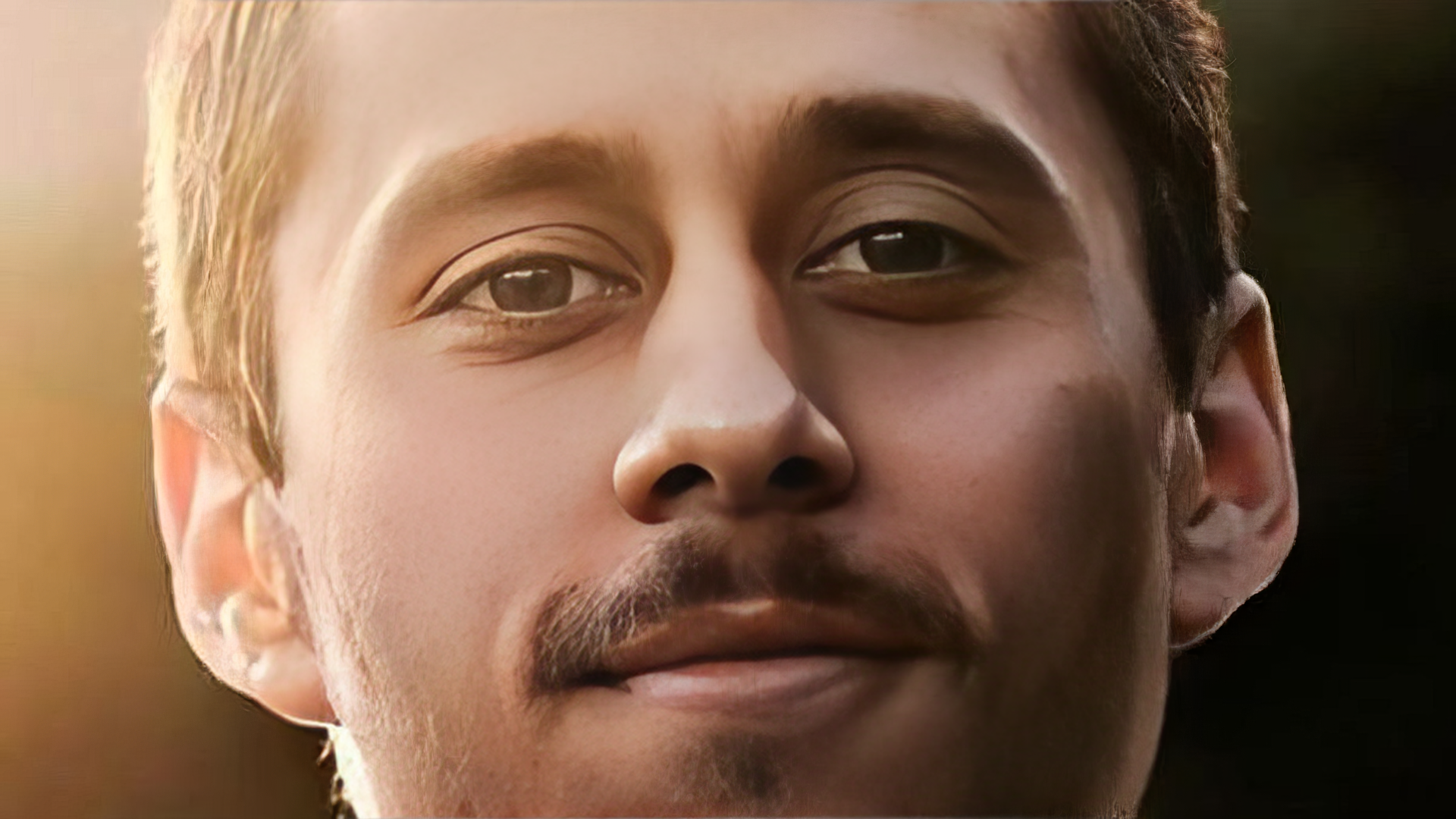 HD Desktop Wallpaper featuring a contemplative man in warm lighting, tagged with music and Canserbero.