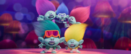 Colorful trolls from *Trolls Band Together* gather joyfully, showcasing vibrant hairstyles and playful expressions in this HD desktop wallpaper. A fun and lively backdrop for any screen!