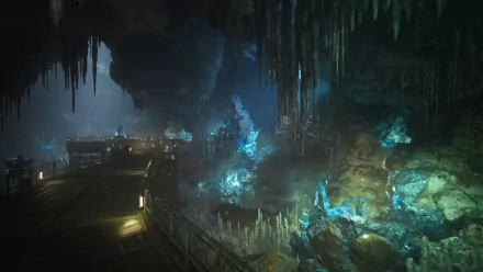 HD desktop wallpaper of a mystical cavern from Final Fantasy VII Rebirth, featuring glowing blue crystals and eerie stalactites.