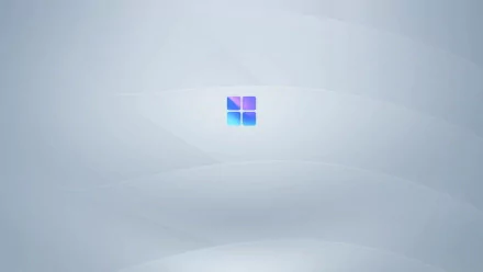 Minimalist Windows 12 4K UHD desktop wallpaper featuring a subtle gris background and the Microsoft Office-inspired logo, blending technology and modern design.