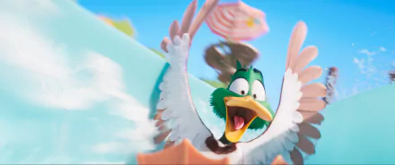Animated duck character from the movie Migration (2023) in flight with a comical expression, set against a clear blue sky - HD desktop wallpaper background.