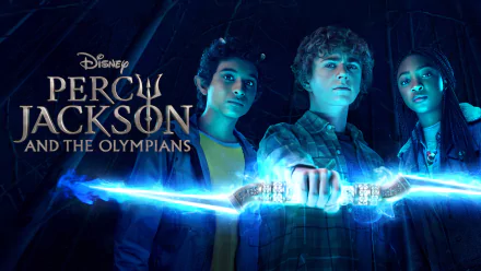 HD Desktop Wallpaper of 'Percy Jackson and the Olympians' TV Show featuring three young heroes with mystical energy emanating from a sword.
