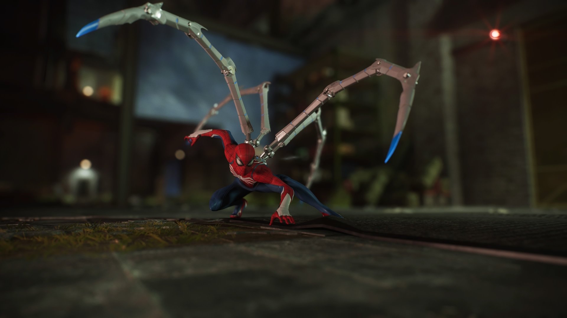 Spider-Man in a crouched pose with mechanical spider legs extended, captured in a 4K Ultra HD scene from Marvel's Spider-Man 2 video game for PC desktop wallpaper.