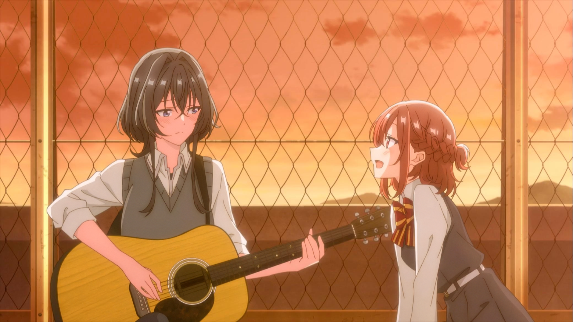 HD wallpaper of two anime characters from 'Whisper Me a Love Song' with one holding a guitar and the other speaking, both behind a fence with a warm, sunset-like glow.